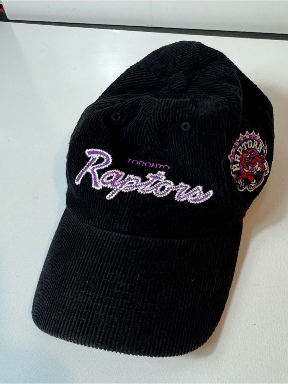 Mitchell & Ness Black Toronto Raptors Corduroy Cap with Purple Embroidery